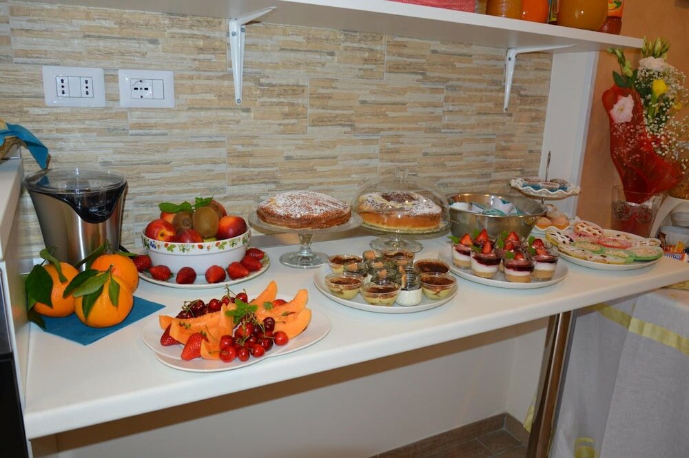 Фото B&b La Conchiglia