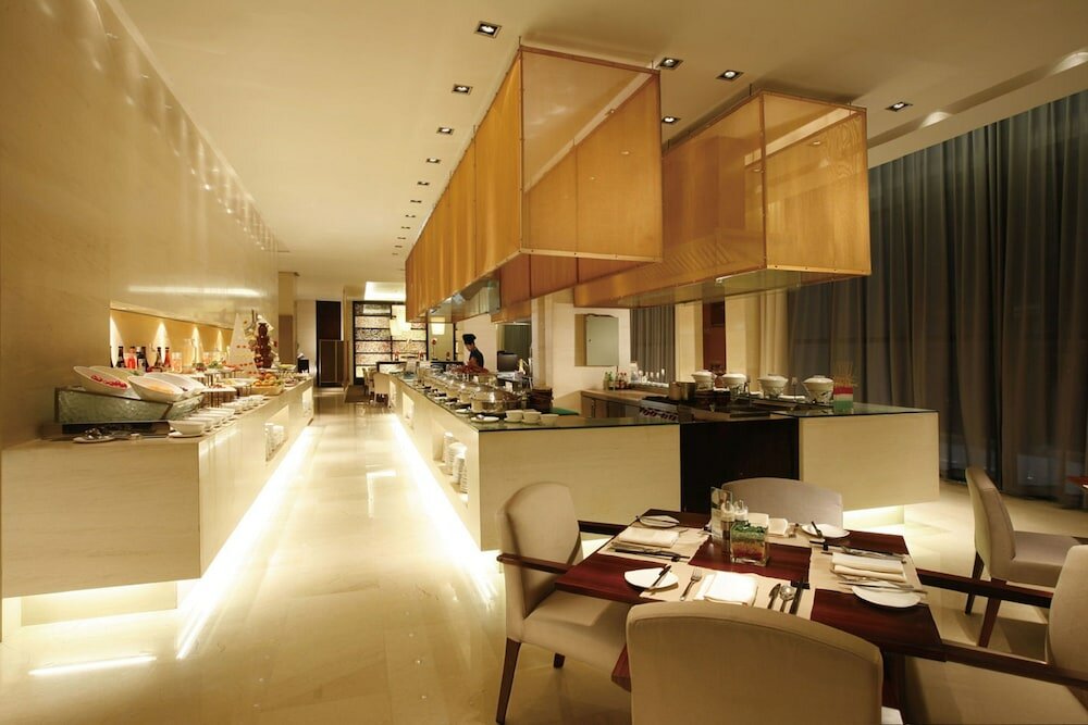 Фото Howard Johnson Parkland Hotel Dalian