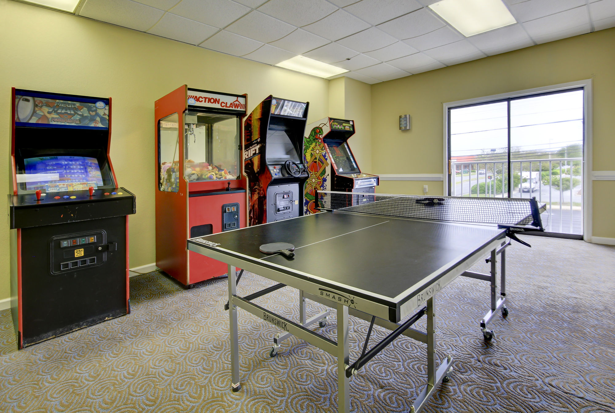 Фото Coastal Palms Inn & Suites