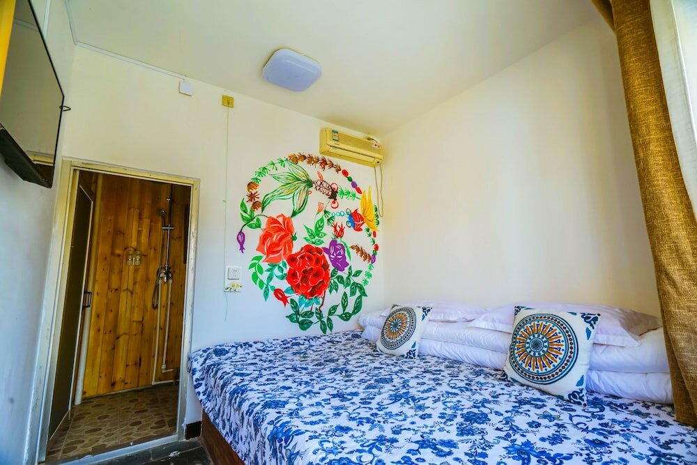 Фото Yijie Holiday Hotel Water GreatWall No. 2