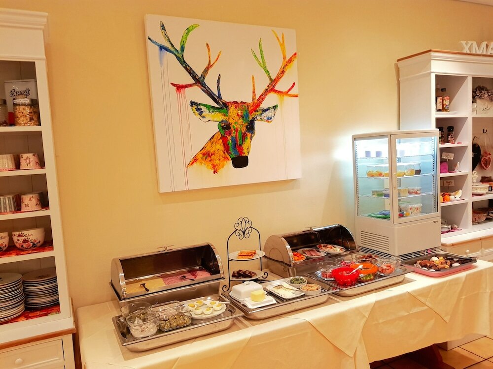 Фото Boutiquehotel Goldene Rose