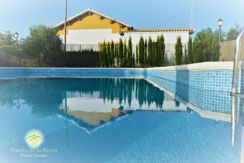 Гостиница Apartamentos Puerta Sierra
