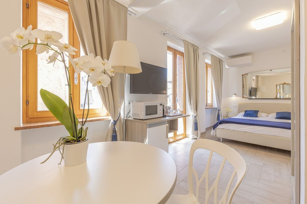 Фото Corte Realdi Boutique Rooms Garda