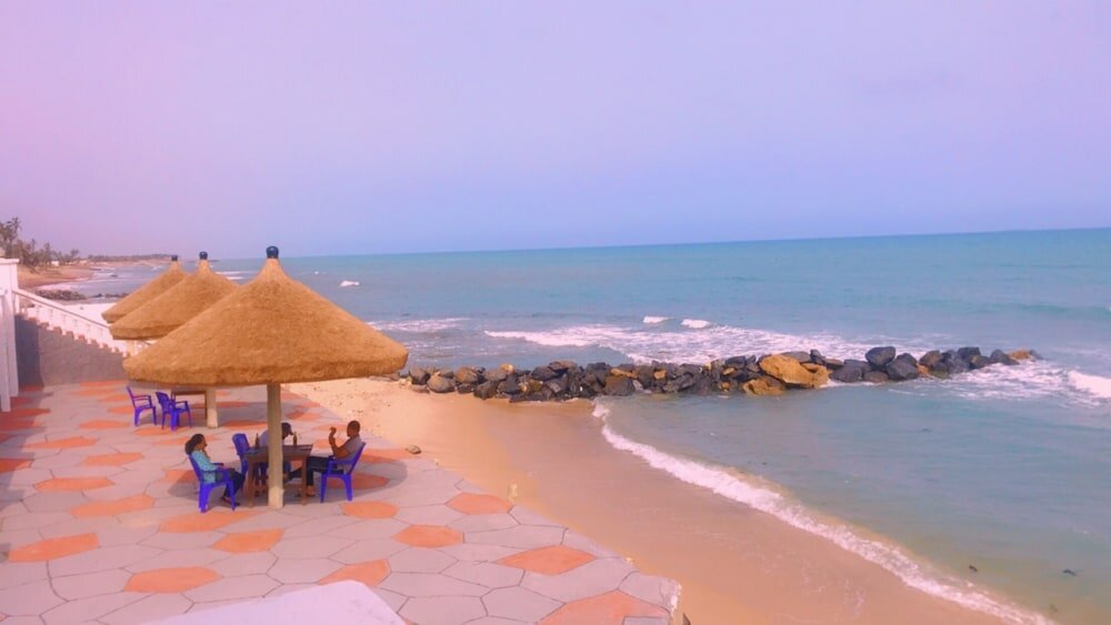 Фото Coconut Pointe Villa & Beach Resort