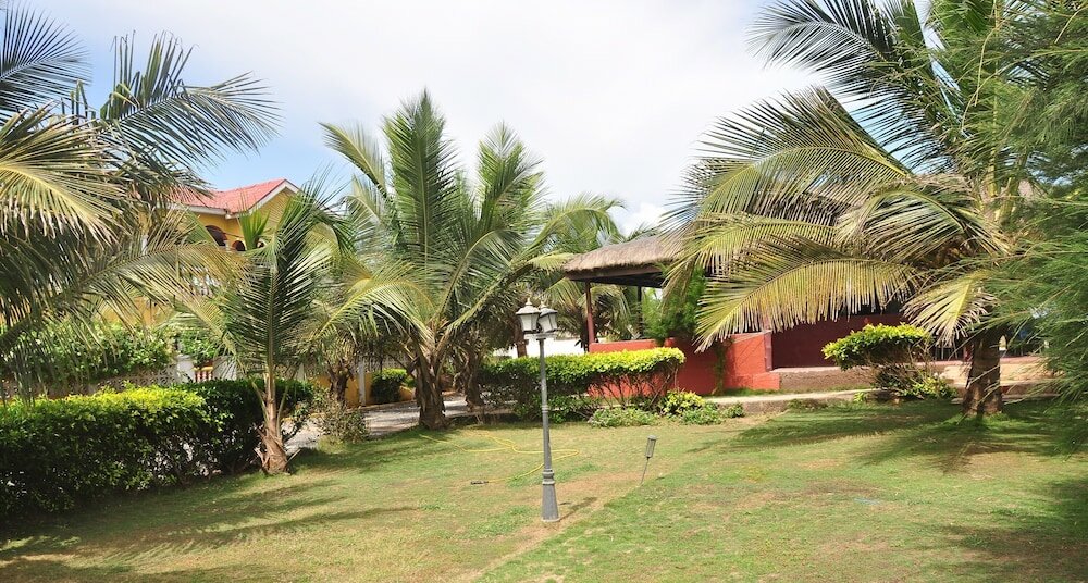 Фото Coconut Pointe Villa & Beach Resort