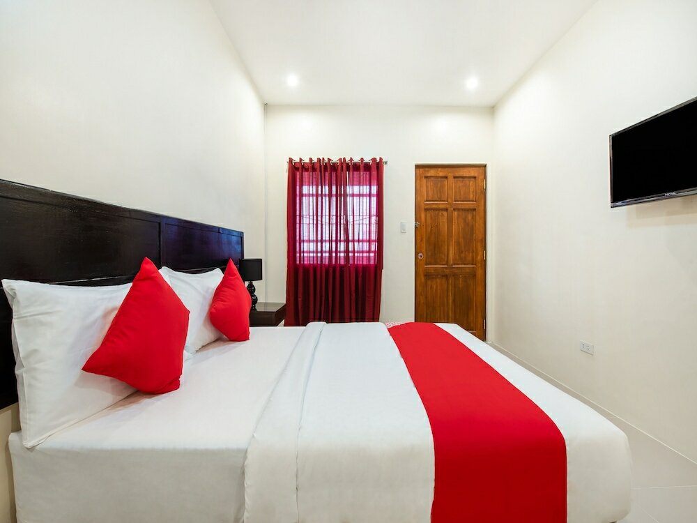 Фото Oyo 490 V-cat Apartelle