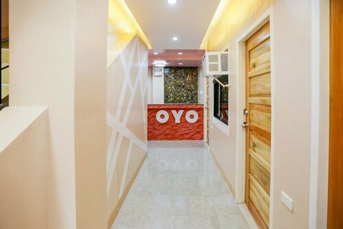 Гостиница Oyo 257 Jrja Suites в Тагуме