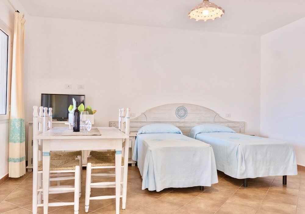 Фото Appartamenti con Wifi e A. C a Orosei