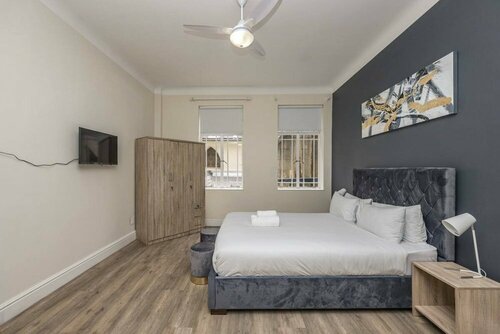 Гостиница Cape Legacy - Bright and Spacious Studio Suite в Кейптауне