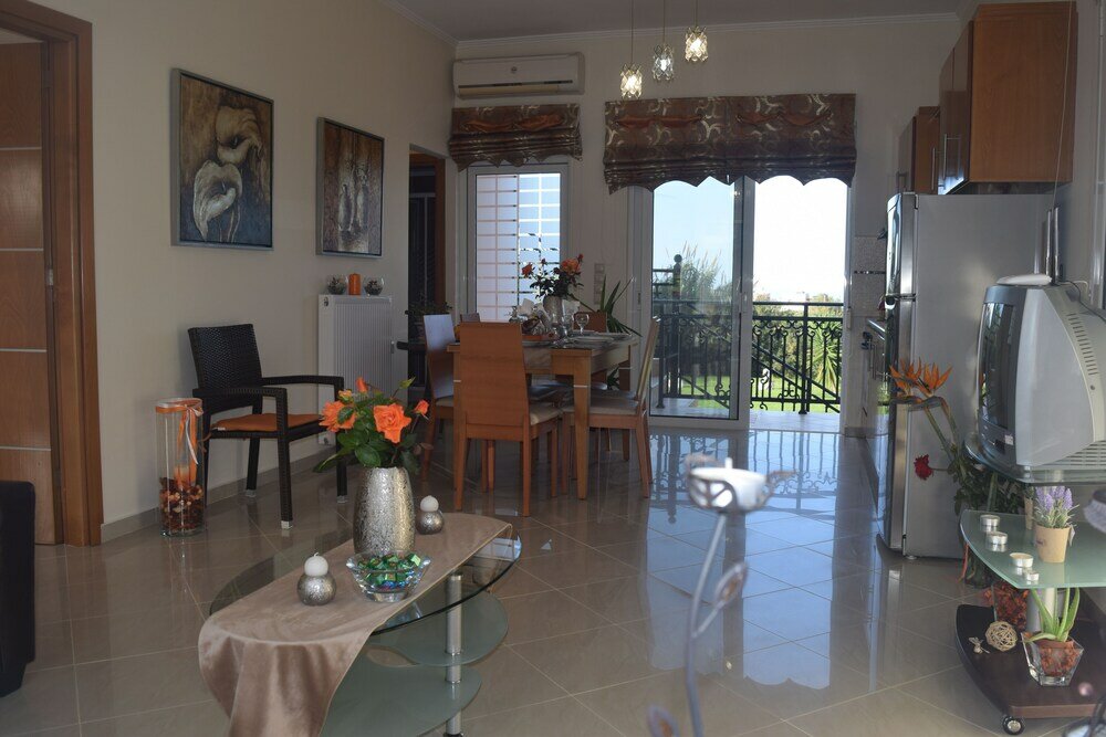 Фото Zoi's Holidays Apartment