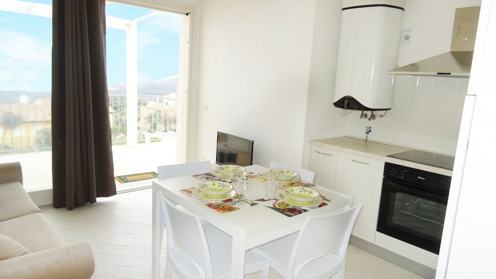 Фото Affittimoderni Isola Rossa Élite - Pati19