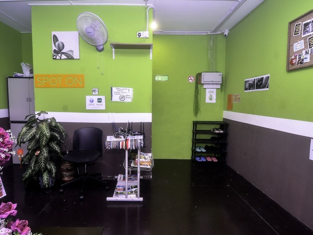 Фото Spot On 89929 Tropical Lodge