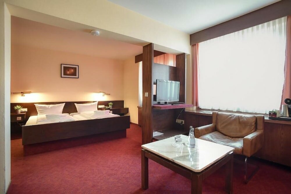 Фото Hotel am Kappelberg