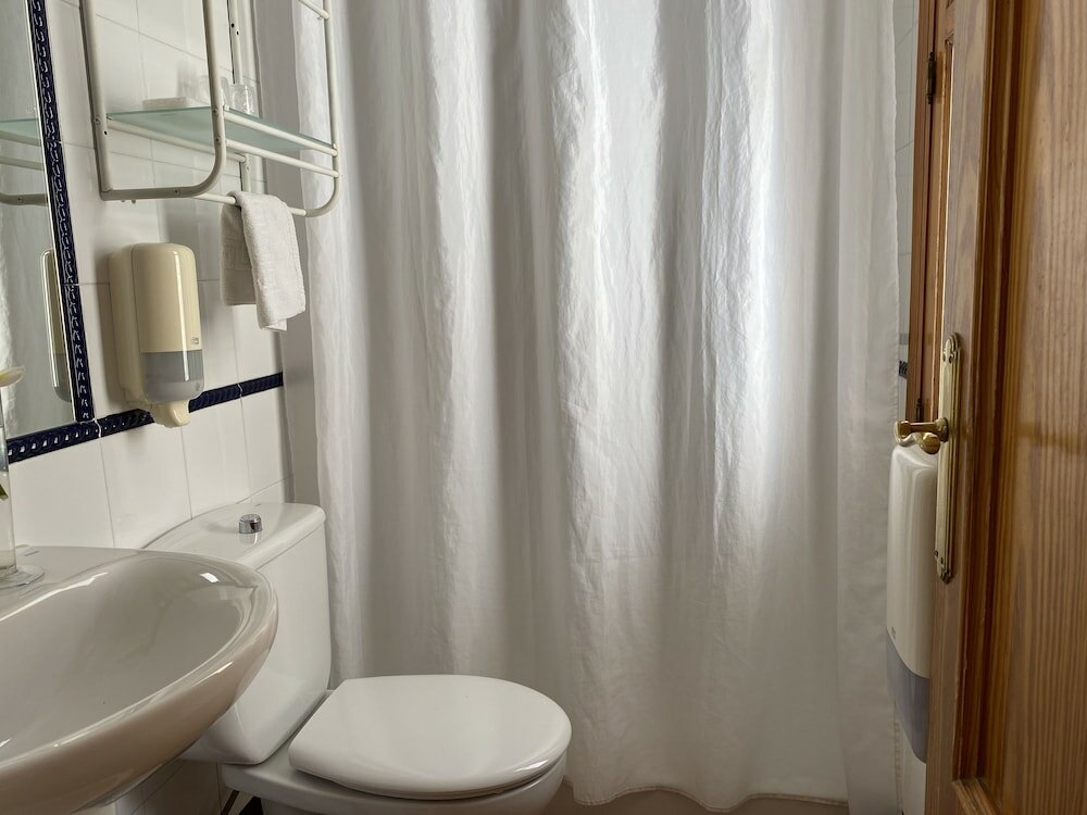 Фото Hostal Moscatel