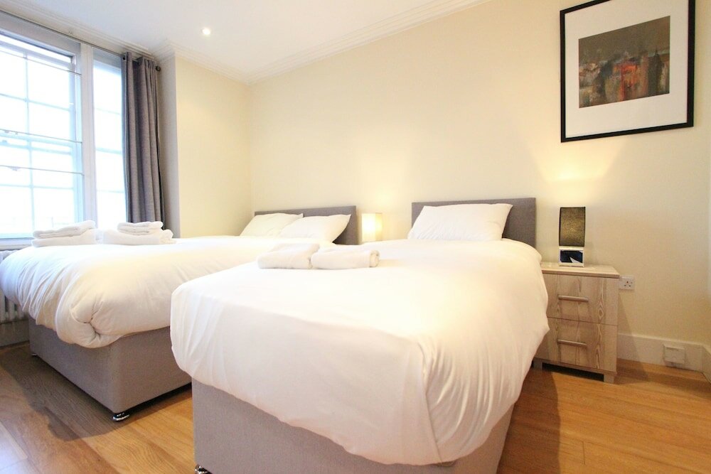 Фото Cosy Central Apartments - Oxford Street