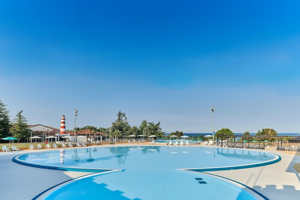 Фото Mediteran Mobile Homes Camping Park Umag