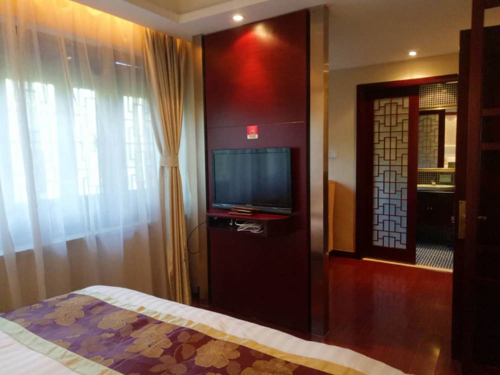Фото Qiao Garden Vacation Hotel