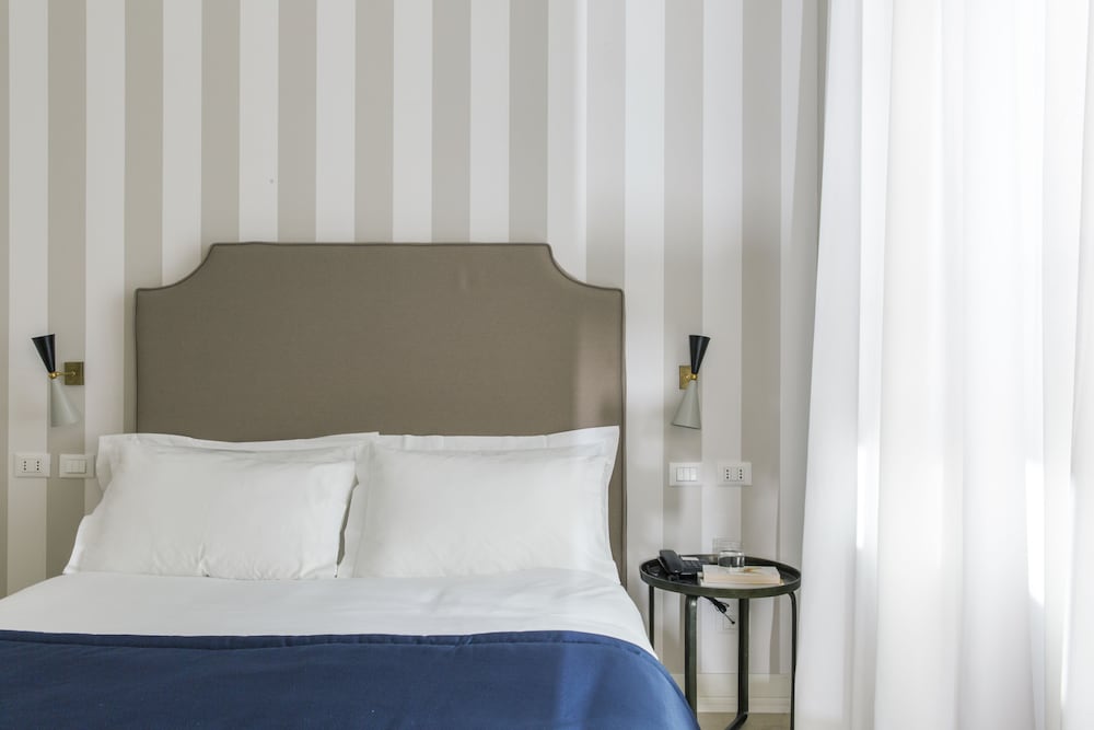 Фото Favilla Hotel di Charme