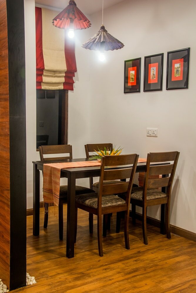 Фото Woodside Inn & Serviced Apartments