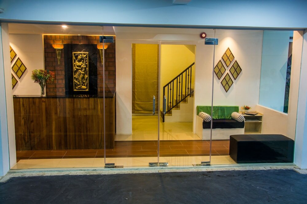Фото Woodside Inn & Serviced Apartments