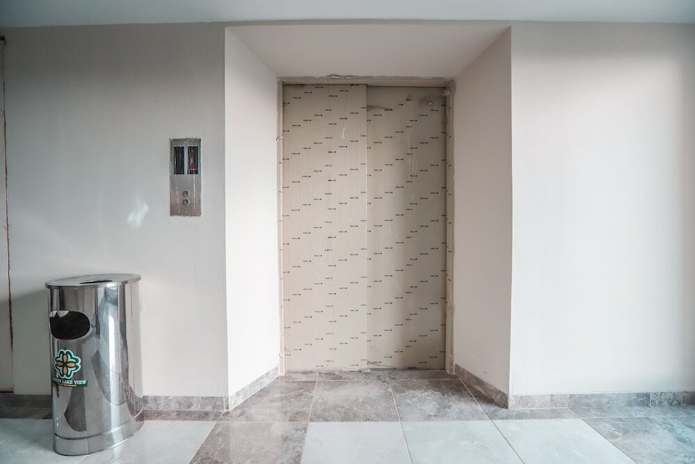 Фото Oyo 498 Green Lake View Ciputat Syariah