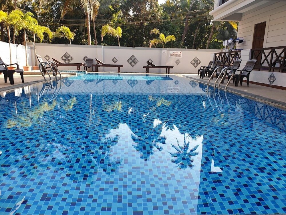 Фото Coastal Suites