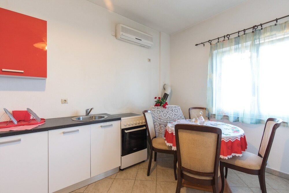 Фото Apartment Lucia & Holiday Home Nino