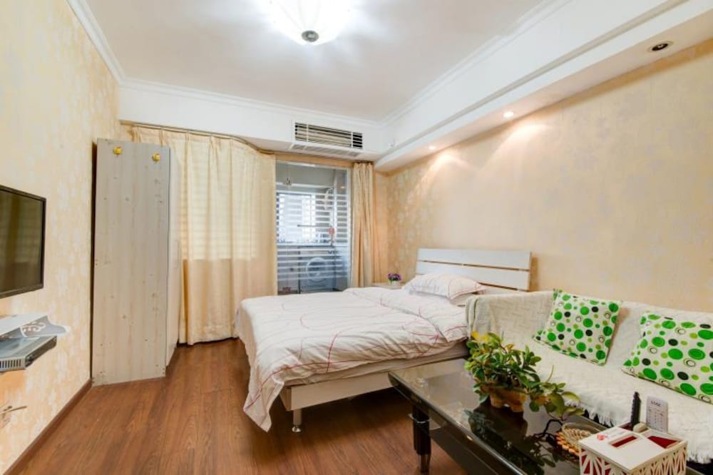 Фото Shenzhen Xinjia Business Apartment