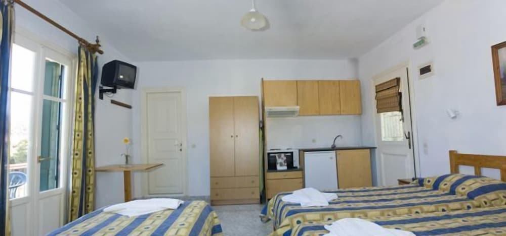 Фото Alexandros Rooms & Studios