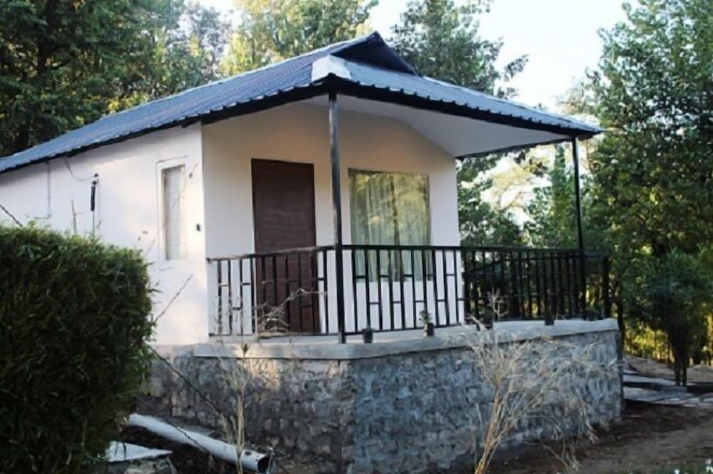 Фото Dev Bhoomi Farms & Cottages