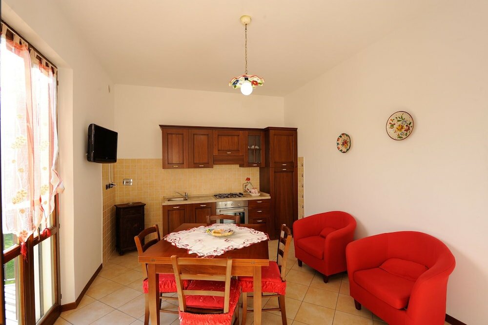 Фото Agriturismo Lustrinu