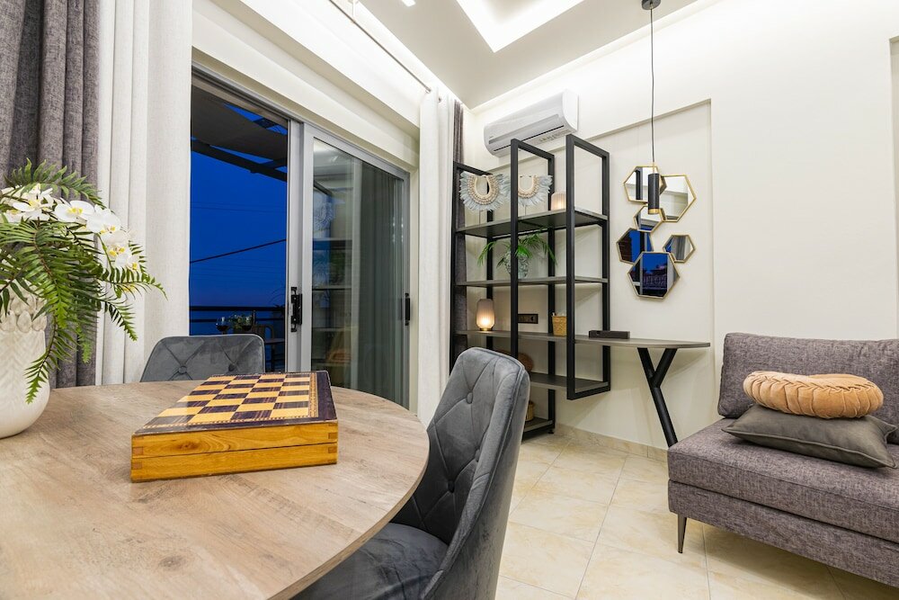 Фото Mouria Studios & Apartments