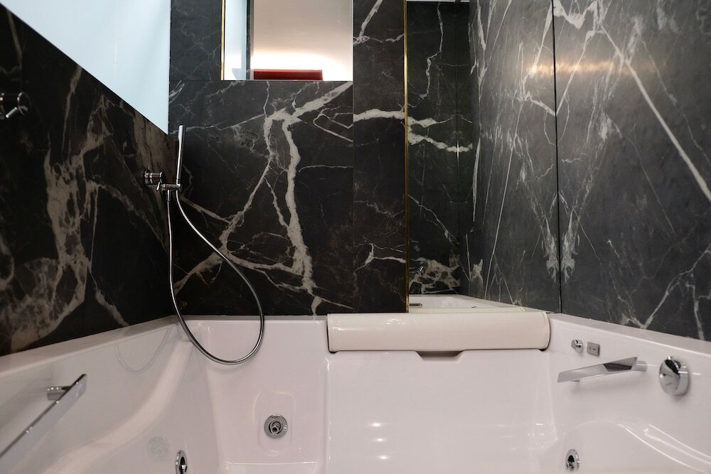 Фото The Boutique Napoli Suite