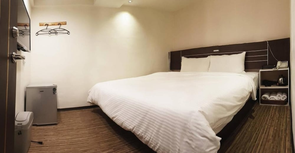 Фото Jhong-Sing Hotel