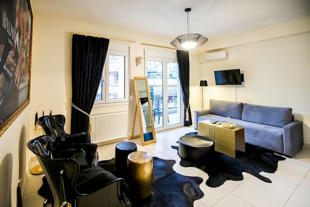 Фото Deluxe Apartments