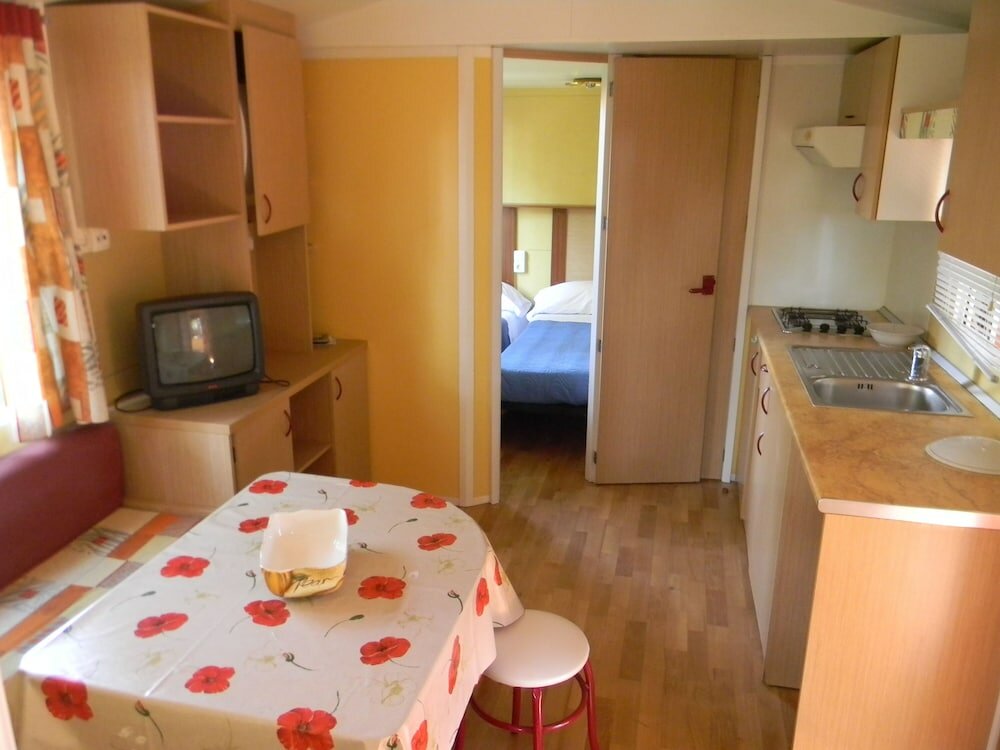 Фото Happy Camp in Camping Villaggio Thurium