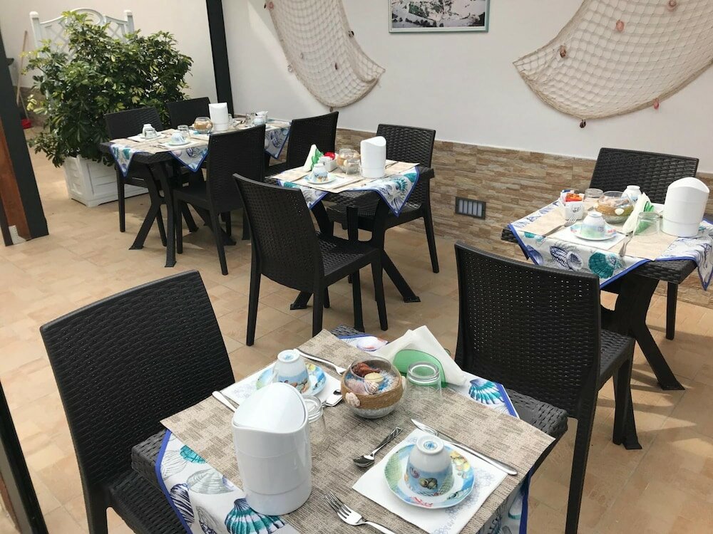 Фото B&b La Conchiglia