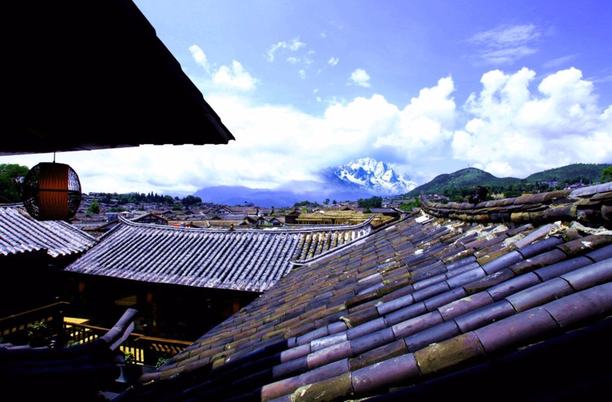 Фото Lijiang Xueshanyu Inn