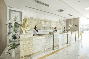 отель Qlusive Hotel