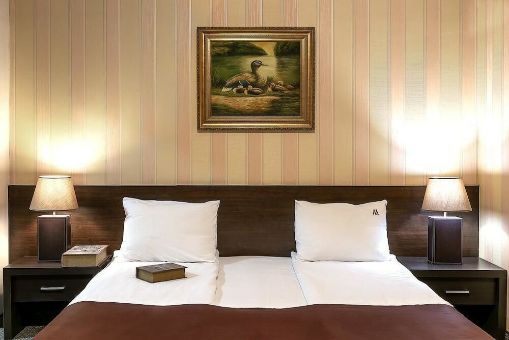 Фото Maxim Boutique Hotel