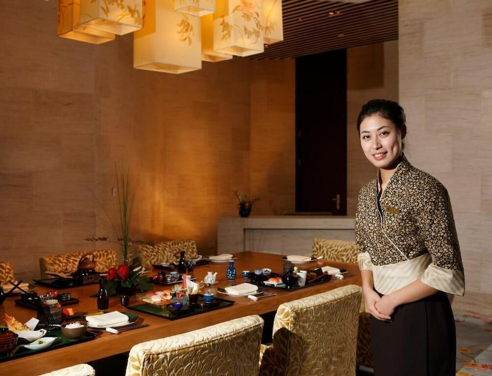 Фото Ningbo Nanyuan Universe Deluxe Hotel