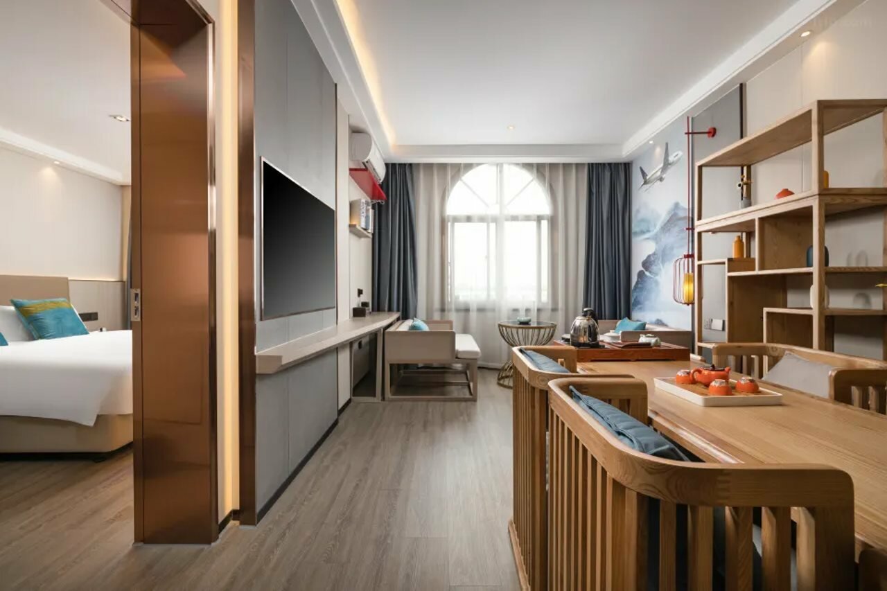 Фото Kaiyuan Manju Xiaoshan International Airport West Gate Store