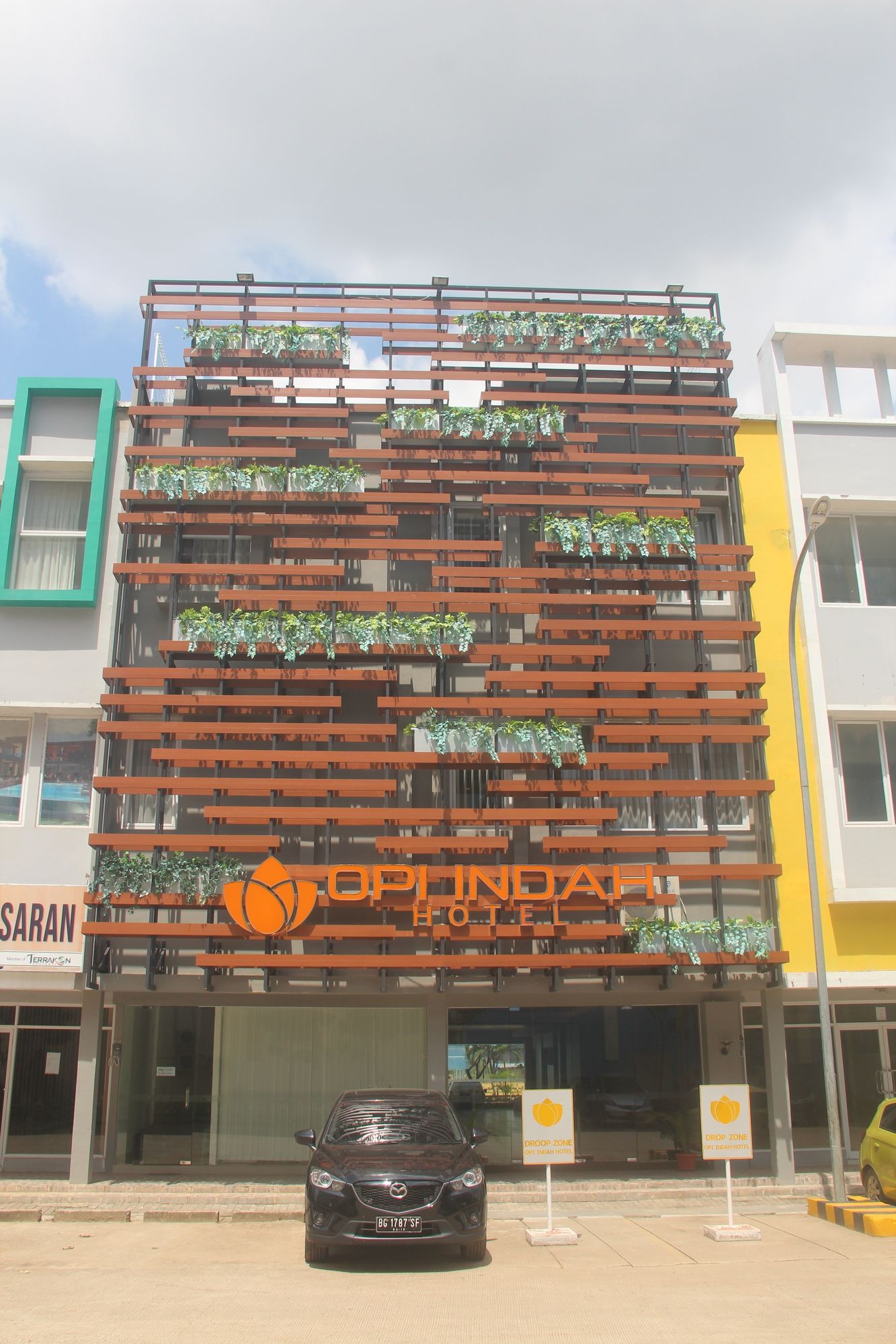 Фото Opi Indah Hotel