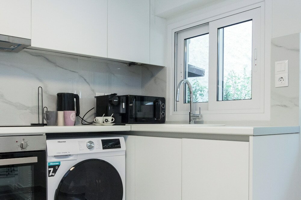 Фото Cozy 1 Bd Basement Apt in Pagrati