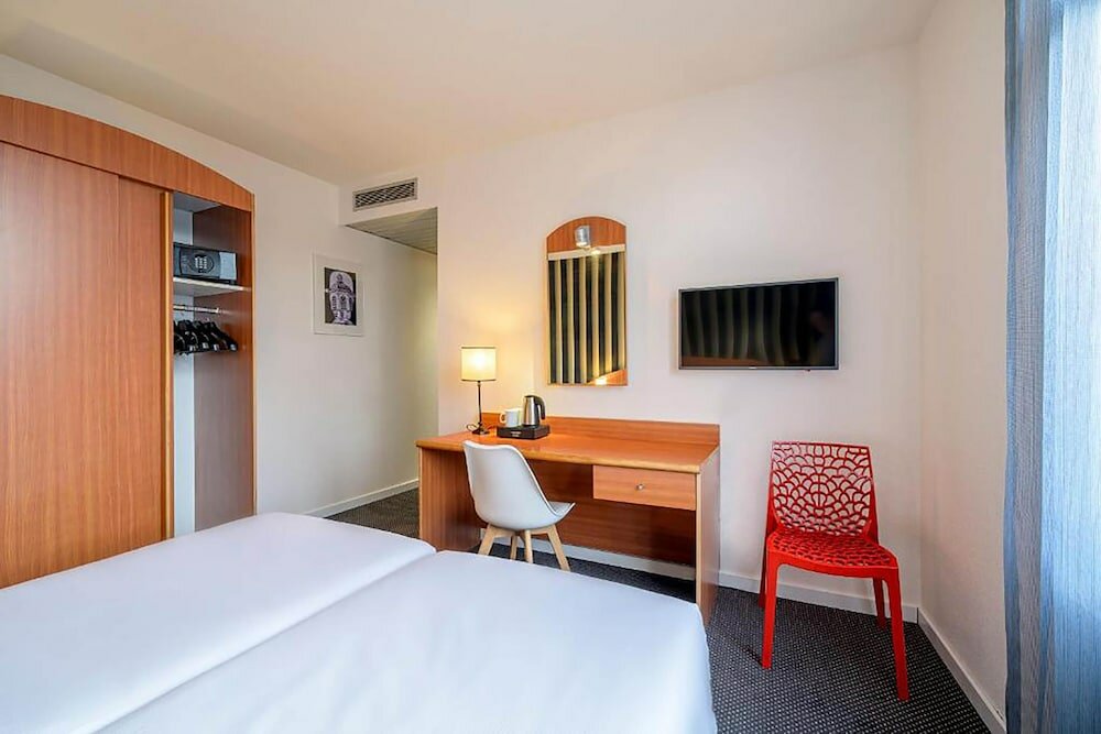 Фото Aris Grand-Place Hotel