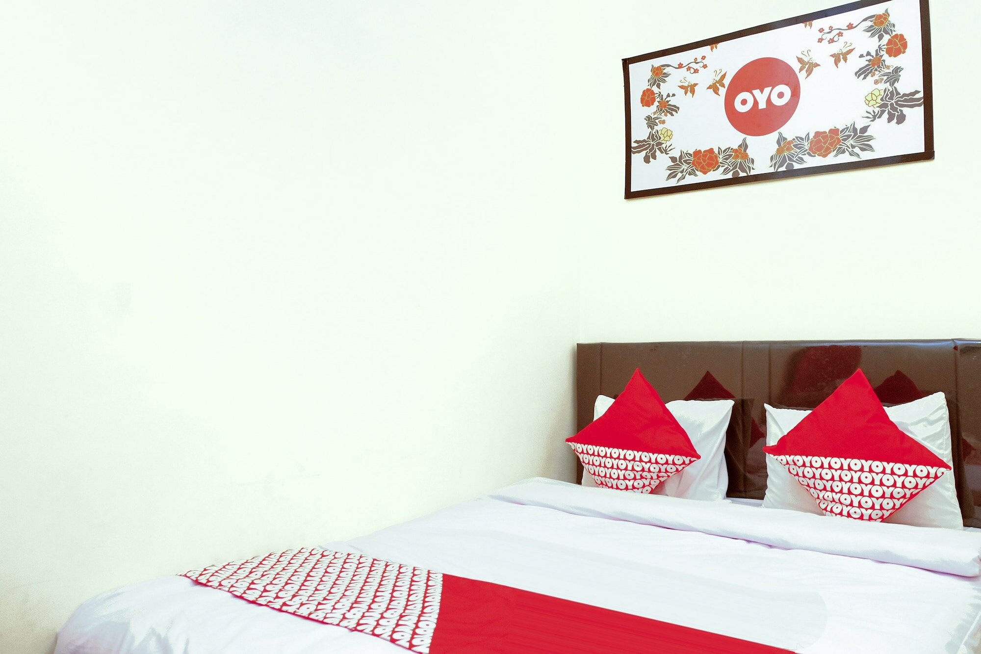 Фото Oyo 314 Emas 23 Guest House Syariah