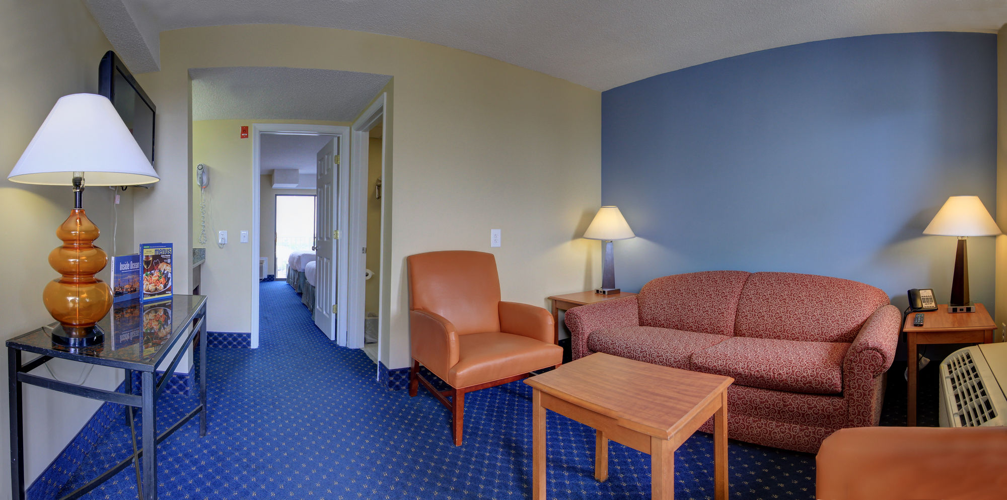 Фото Coastal Palms Inn & Suites