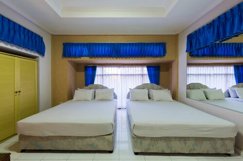 Гостиница Oyo 3134 Puri Tamu Hotel в Джимбаране