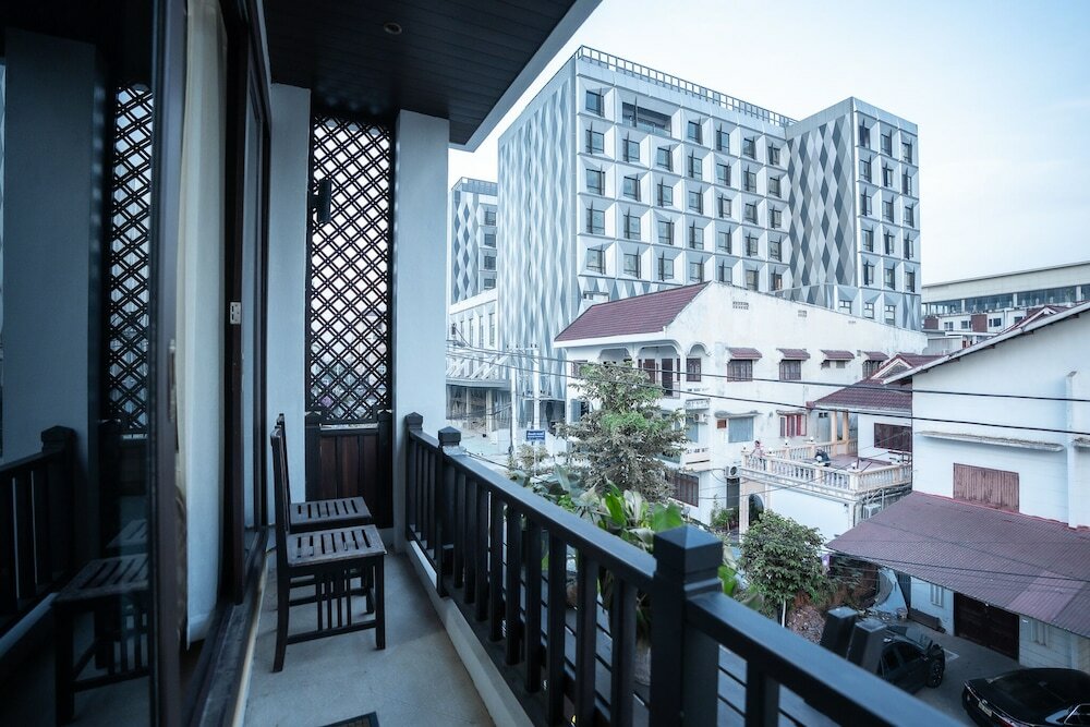Фото Vongkhamsene Boutique Hotel