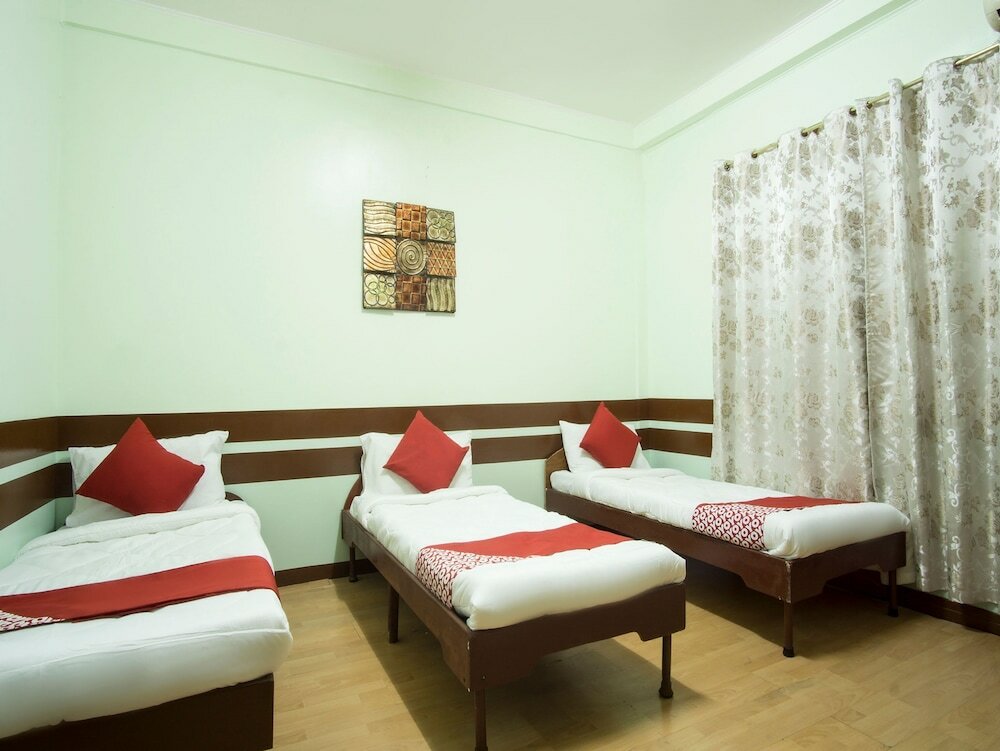 Фото Oyo 130 Jy Crown Palace - Hostel
